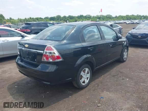 2007 Chevrolet Aveo LS with VIN KL1TD56627B055436, listed as a IAAI auction lot 42462092 with 102,923 mi miles and . Bid and sale history available at DreamBid. Image 4.