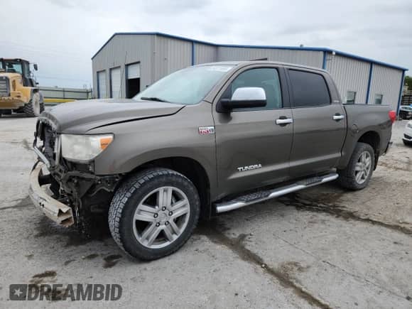 2012 Toyota Tundra Limited z VIN 5TFFY5F17CX126867, wystawiony jako Copart lot #84811695 z przebiegiem 150 642 mil mil oraz Szkoda całkowita • Salvage title. Historia ofert i sprzedaży dostępna na DreamBid. Obrazek 1.