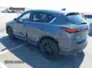 2022 Mazda CX-5 S Carbon Edition z VIN JM3KFBCM7N1601447, wystawiony jako IAAI lot #42463014 z przebiegiem 37 126 mil mil oraz . Historia ofert i sprzedaży dostępna na DreamBid. Obrazek 3.
