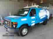 2014 Ford Econoline Cargo Commercial with VIN 1FTNE1EW9EDA70011, listed as a IAAI auction lot 37021285 with 244,383 mi miles and . Bid and sale history available at DreamBid. Image 2.