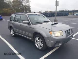 2007 Subaru Forester Special Sports XT z VIN JF1SG69637H740500, wystawiony jako IAAI lot #43586696 z przebiegiem 106 874 mil mil oraz . Historia ofert i sprzedaży dostępna na DreamBid. Obrazek 1.