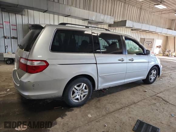 2007 Honda Odyssey EX-L с VIN 5FNRL38707B119874, выставлен на аукционе Copart как лот 82385185 с пробегом 221 416 миль миль и На запчасти • Non repairable. История ставок и продаж доступна на DreamBid. Изображение 3.