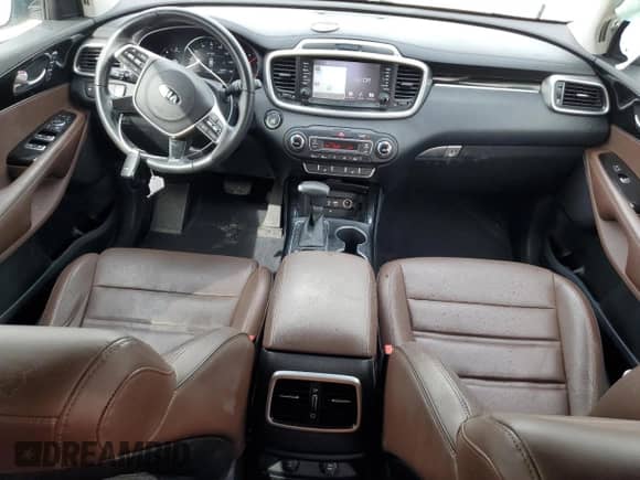 2020 Kia Sorento SX с VIN 5XYPK4A59LG707719, выставлен на аукционе Copart как лот 70035724 с пробегом 56 069 миль миль и Списание • Salvage title. История ставок и продаж доступна на DreamBid. Изображение 8.