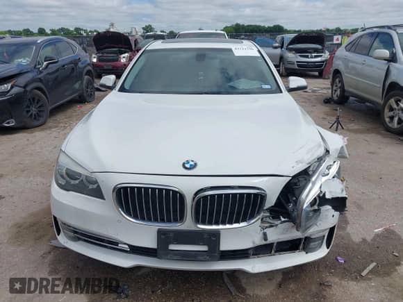 2013 BMW 7 Series 740Li with VIN WBAYE4C54DD136923, listed as a IAAI auction lot 42211590 with 86,773 mi miles and . Bid and sale history available at DreamBid. Image 12.
