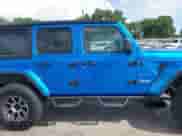 2022 Jeep Wrangler Unlimited Sahara with VIN 1C4HJXENXNW118607, listed as a IAAI auction lot 42536834 with 29,917 mi miles and . Bid and sale history available at DreamBid. Image 14.