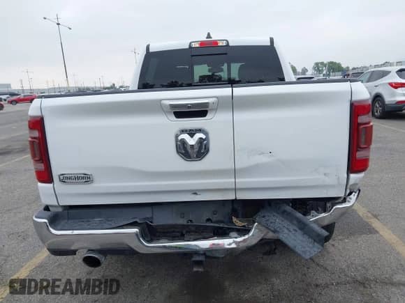 2020 Ram 1500 Longhorn with VIN 1C6RREKT5LN191639, listed as a IAAI auction lot 42348204 with 64,654 mi miles and . Bid and sale history available at DreamBid. Image 17.