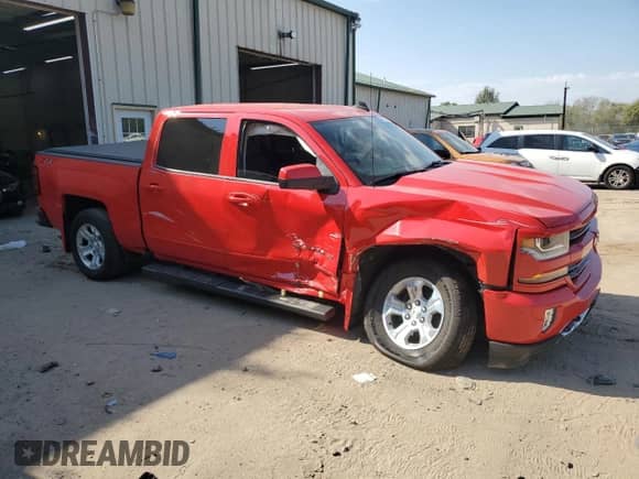 2018 Chevrolet Silverado 1500 LT z VIN 3GCUKREC0JG228435, wystawiony jako Copart lot #81993275 z przebiegiem 153 865 mil mil oraz Szkoda całkowita • Salvage title. Historia ofert i sprzedaży dostępna na DreamBid. Obrazek 4.
