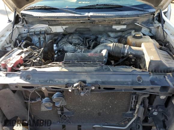 2012 Ford F-150 XL с VIN 1FTEX1CM1CFC81359, выставлен на аукционе Copart как лот 87804155 с пробегом 258 508 миль миль и Списание • Salvage title. История ставок и продаж доступна на DreamBid. Изображение 11.