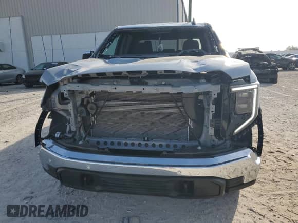 2024 GMC Sierra 1500 SLE with VIN 1GTUUBED0RZ274966, listed as a Copart auction lot 87474084 with 2,338 mi miles and Salvage title. Bid and sale history available at DreamBid. Image 5.