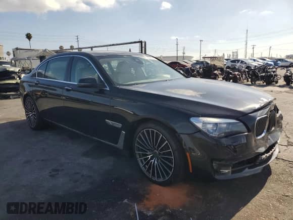 2013 BMW 7 Series 740Li xDrive с VIN WBAYF4C55DD127791, выставлен на аукционе Copart как лот 66229385 с пробегом 46 859 миль миль и Списание • Salvage title. История ставок и продаж доступна на DreamBid. Изображение 4.