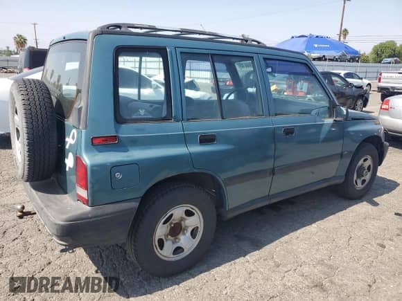 1997 Chevrolet Tracker с VIN 2CNBJ1361V6922816, выставлен на аукционе Copart как лот 58968815 с пробегом 178 601 миль миль и Чистый • Clean title. История ставок и продаж доступна на DreamBid. Изображение 3.