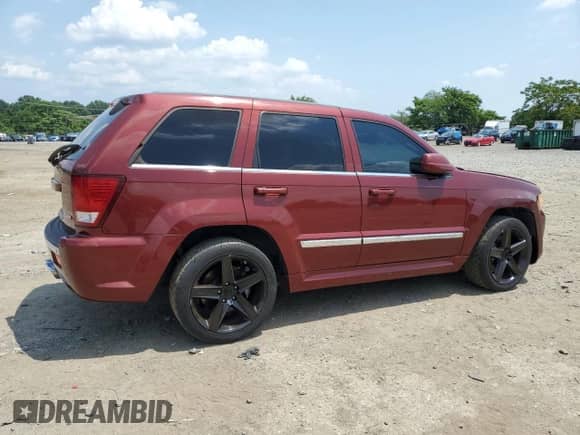 2008 Jeep Grand Cherokee SRT-8 with VIN 1J8HR78328C201014, listed as a Copart auction lot 64158155 with 99,004 mi miles and Clean title. Bid and sale history available at DreamBid. Image 3.