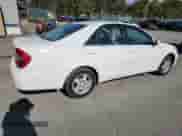 2003 Toyota Camry LE z VIN 4T1BF32K23U053315, wystawiony jako Copart lot #84719875 z przebiegiem 83 287 mil mil oraz Szkoda całkowita • Salvage title. Historia ofert i sprzedaży dostępna na DreamBid. Obrazek 3.