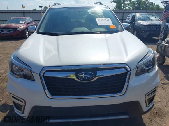 2020 Subaru Forester Touring with VIN JF2SKAXCXLH493203, listed as a IAAI auction lot 42983342 with 109,124 mi miles and . Bid and sale history available at DreamBid. Image 13.