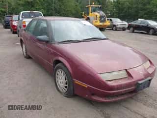 1994 Saturn SL z VIN 1G8ZK5570RZ328946, wystawiony jako IAAI lot #42904347 z przebiegiem 164 028 mil mil oraz . Historia ofert i sprzedaży dostępna na DreamBid. Obrazek 1.