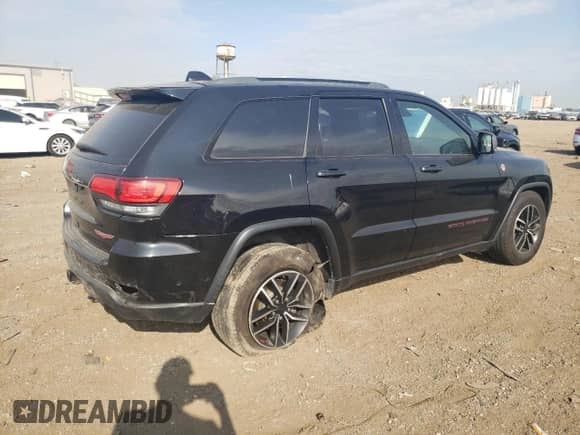 2019 Jeep Grand Cherokee Trailhawk with VIN 1C4RJFLG3KC785065, listed as a Copart auction lot 80269765 with 129,881 mi miles and Salvage title. Bid and sale history available at DreamBid. Image 3.