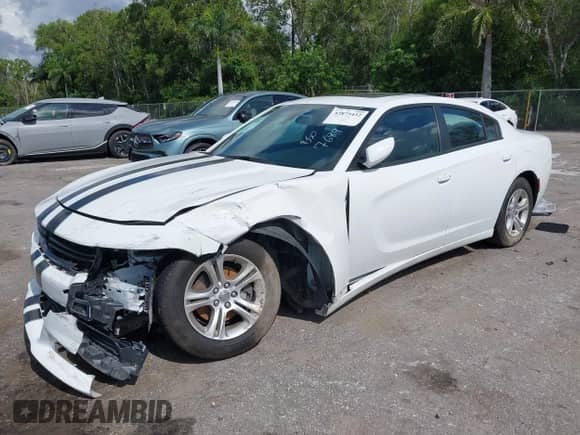 2020 Dodge Charger SXT with VIN 2C3CDXBG4LH247689, listed as a IAAI auction lot 42875432 with 90,588 mi miles and . Bid and sale history available at DreamBid. Image 2.