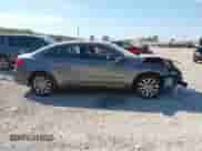 2013 Chrysler 200 Touring with VIN 1C3CCBBG0DN703489, listed as a IAAI auction lot 43361410 with 121,917 mi miles and . Bid and sale history available at DreamBid. Image 14.