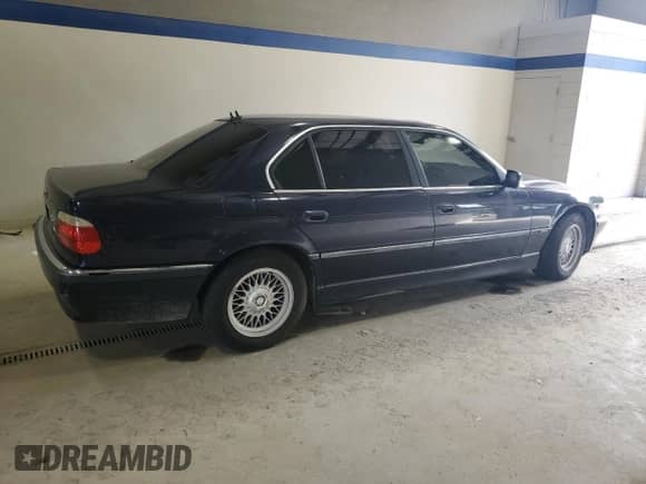 2001 BMW 7 Series 740iL with VIN WBAGH83461DP21421, listed as a Copart auction lot 84357185 with 233,065 mi miles and Clean title. Bid and sale history available at DreamBid. Image 3.