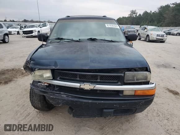 1999 Chevrolet Blazer LS z VIN 1GNCS13W0X2133425, wystawiony jako Copart lot #81930324 z przebiegiem 224 669 mil mil oraz Szkoda całkowita • Salvage title. Historia ofert i sprzedaży dostępna na DreamBid. Obrazek 5.