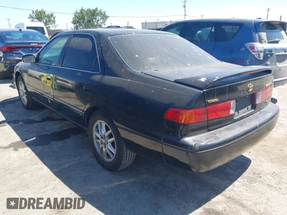 2001 Toyota Camry LE z VIN JT2BF28K110306353, wystawiony jako IAAI lot #42690685 z przebiegiem 309 278 mil mil oraz . Historia ofert i sprzedaży dostępna na DreamBid. Obrazek 3.