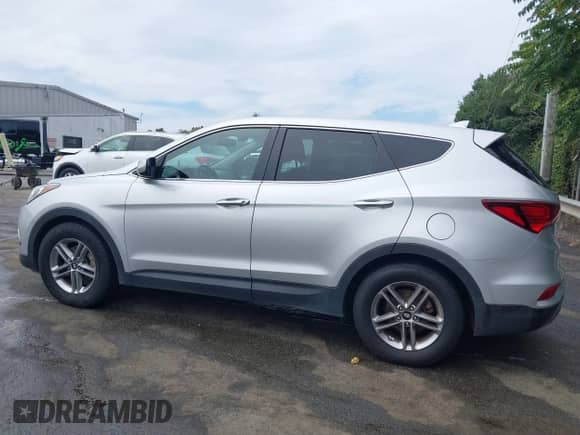 2017 Hyundai Santa Fe 2.4L with VIN 5XYZTDLB5HG453152, listed as a IAAI auction lot 43225256 with 143,758 mi miles and . Bid and sale history available at DreamBid. Image 14.