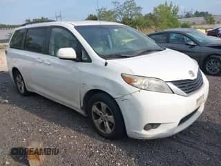 2014 Toyota Sienna LE AAS with VIN 5TDKK3DC4ES493579, listed as a IAAI auction lot 43292330 with 304,534 mi miles and . Bid and sale history available at DreamBid. Image 1.