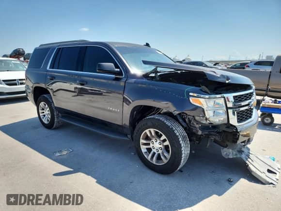 2017 Chevrolet Tahoe LS with VIN 1GNSCAKC4HR307747, listed as a Copart auction lot 71515745 with Not provided miles and Salvage title. Bid and sale history available at DreamBid. Image 4.