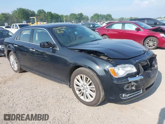2013 Chrysler 300 C with VIN 2C3CCAKT6DH712522, listed as a IAAI auction lot 42694738 with 171,235 mi miles and . Bid and sale history available at DreamBid. Image 1.