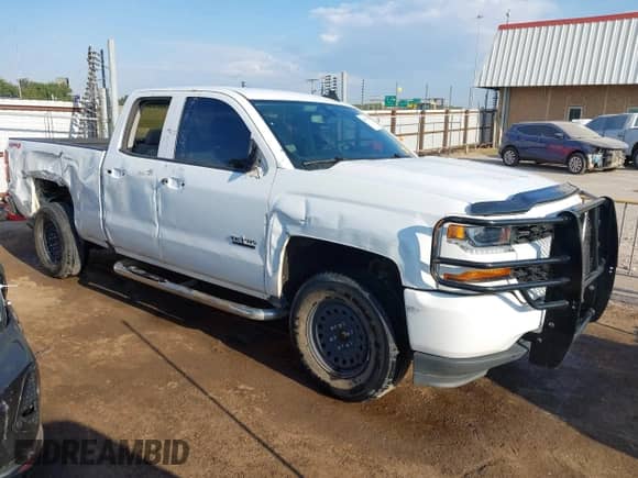 2019 Chevrolet Silverado 1500 Custom z VIN 2GCVKMEC7K1243970, wystawiony jako IAAI lot #43347102 z przebiegiem 79 556 mil mil oraz . Historia ofert i sprzedaży dostępna na DreamBid. Obrazek 1.