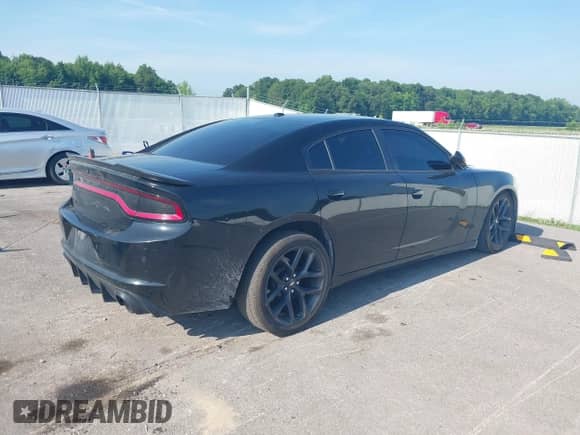 2021 Dodge Charger SXT with VIN 2C3CDXBG0MH605372, listed as a IAAI auction lot 42598353 with 133,270 mi miles and . Bid and sale history available at DreamBid. Image 4.