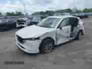 2024 Mazda CX-5 S Preferred z VIN JM3KFBCM7R0364230, wystawiony jako IAAI lot #41859044 z przebiegiem 13 899 mil mil oraz . Historia ofert i sprzedaży dostępna na DreamBid. Obrazek 2.