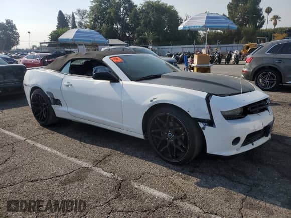 2014 Chevrolet Camaro LT z VIN 2G1FB3D36E9127402, wystawiony jako Copart lot #66957505 z przebiegiem Nie podano mil oraz Szkoda całkowita • Salvage title. Historia ofert i sprzedaży dostępna na DreamBid. Obrazek 4.