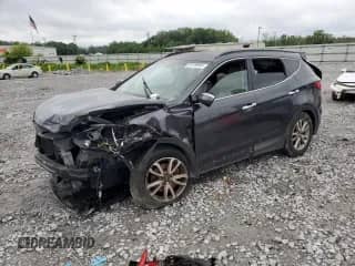 2015 Hyundai Santa Fe с VIN 5XYZU3LA8FG298415, выставлен на аукционе Copart как лот 56180645 с пробегом 181 723 миль миль и Списание • Salvage title. История ставок и продаж доступна на DreamBid. Изображение 1.