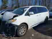 2013 Toyota Sienna XLE AAS with VIN 5TDYK3DC1DS341977, listed as a IAAI auction lot 41418311 with Not provided miles and . Bid and sale history available at DreamBid. Image 2.