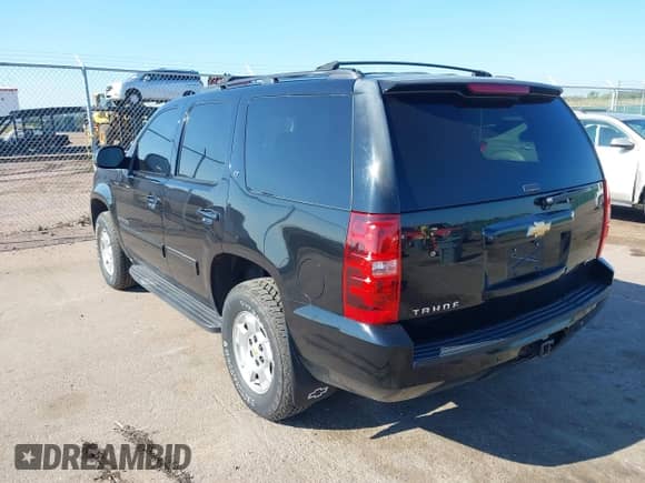 2009 Chevrolet Tahoe 2LT with VIN 1GNFK23079R260424, listed as a IAAI auction lot 43026277 with 253,109 mi miles and . Bid and sale history available at DreamBid. Image 3.