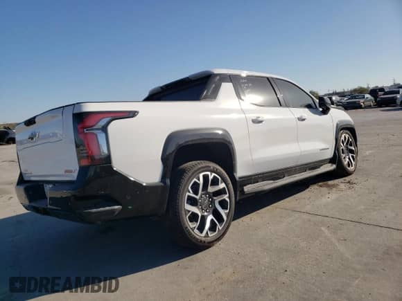 2024 Chevrolet Silverado EV RST с VIN 1GC40ZEL3RU302266, выставлен на аукционе Copart как лот 48977185 с пробегом Не указан миль и Списание • Salvage title. История ставок и продаж доступна на DreamBid. Изображение 3.