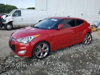 2013 Hyundai Veloster w/Black Int z VIN KMHTC6AD5DU088630, wystawiony jako Copart lot #80093115 z przebiegiem 76 327 mil mil oraz Szkoda całkowita • Salvage title. Historia ofert i sprzedaży dostępna na DreamBid. Obrazek 1.