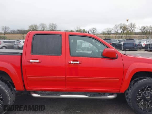 2012 Chevrolet Colorado 2LT z VIN 1GCHTDFE5C8116837, wystawiony jako IAAI lot #42084260 z przebiegiem 116 985 mil mil oraz . Historia ofert i sprzedaży dostępna na DreamBid. Obrazek 13.
