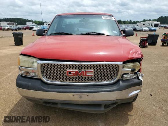 2002 GMC Sierra 1500 z VIN 1GTEC14W52Z338669, wystawiony jako Copart lot #53890055 z przebiegiem Nie podano mil oraz Szkoda całkowita • Salvage title. Historia ofert i sprzedaży dostępna na DreamBid. Obrazek 5.