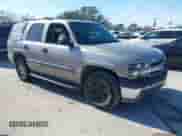2003 Chevrolet Tahoe LS z VIN 1GNEC13Z13R228111, wystawiony jako IAAI lot #41505497 z przebiegiem 242 072 mil mil oraz . Historia ofert i sprzedaży dostępna na DreamBid. Obrazek 1.