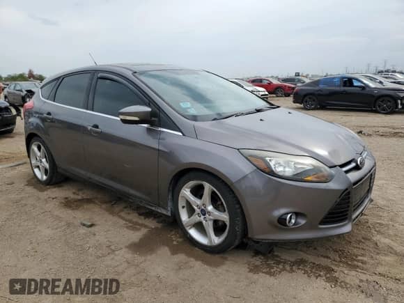 2013 Ford Focus Titanium z VIN 1FADP3N22DL231906, wystawiony jako Copart lot #81408625 z przebiegiem 99 991 mil mil oraz Szkoda całkowita • Salvage title. Historia ofert i sprzedaży dostępna na DreamBid. Obrazek 4.