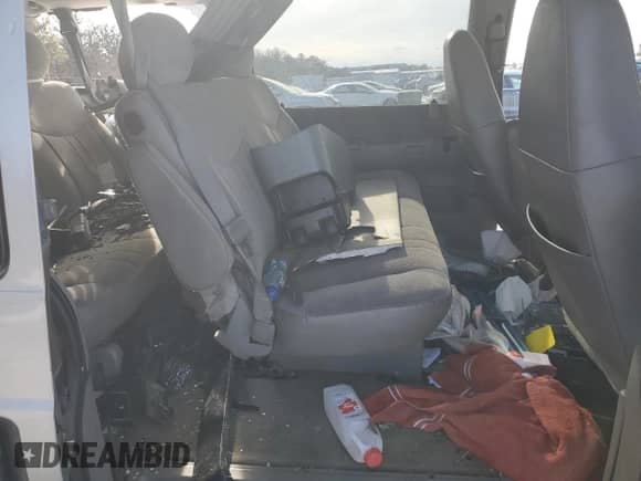 2005 Chevrolet Astro z VIN 1GNDM19X55B128751, wystawiony jako Copart lot #88860595 z przebiegiem Nie podano mil oraz Szkoda całkowita • Salvage title. Historia ofert i sprzedaży dostępna na DreamBid. Obrazek 12.