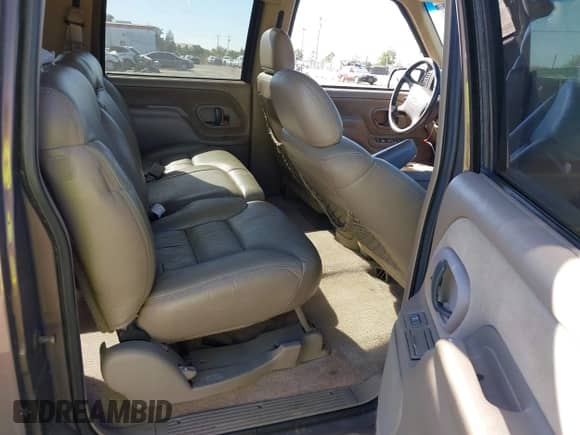 1997 Chevrolet Suburban with VIN 3GNGK26J5VG157926, listed as a IAAI auction lot 43140067 with 143,154 mi miles and . Bid and sale history available at DreamBid. Image 8.
