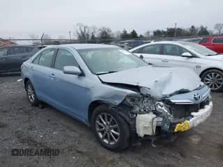 2010 Toyota Camry with VIN 4T1BB3EK6AU125315, listed as a IAAI auction lot 41552627 with 104,538 mi miles and . Bid and sale history available at DreamBid. Image 1.