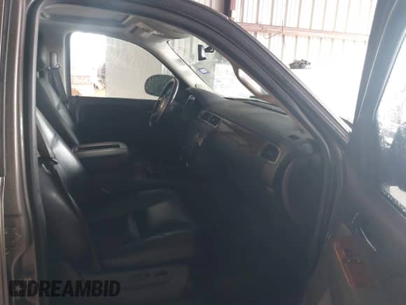 2014 Chevrolet Suburban LTZ with VIN 1GNSCKE02ER144177, listed as a IAAI auction lot 42727544 with 240,952 mi miles and . Bid and sale history available at DreamBid. Image 5.