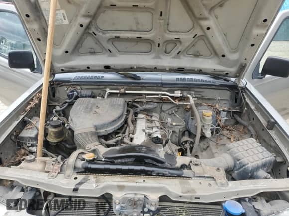 2002 Nissan Frontier XE with VIN 1N6DD26S12C373654, listed as a Copart auction lot 90818325 with Not provided miles and Clean title. Bid and sale history available at DreamBid. Image 11.