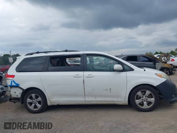 2012 Toyota Sienna LE AAS with VIN 5TDKK3DC0CS261672, listed as a IAAI auction lot 43256260 with 477,784 mi miles and . Bid and sale history available at DreamBid. Image 13.
