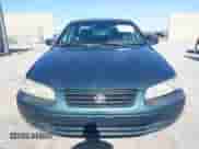 1997 Toyota Camry LE z VIN 4T1BF22KXVU915631, wystawiony jako IAAI lot #42552584 z przebiegiem 226 135 mil mil oraz . Historia ofert i sprzedaży dostępna na DreamBid. Obrazek 6.