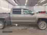 2014 Chevrolet Silverado 1500 LTZ with VIN 3GCUKSEC9EG225675, listed as a IAAI auction lot 42165845 with 139,417 mi miles and . Bid and sale history available at DreamBid. Image 14.